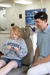 Dr. Marshall with girl patient