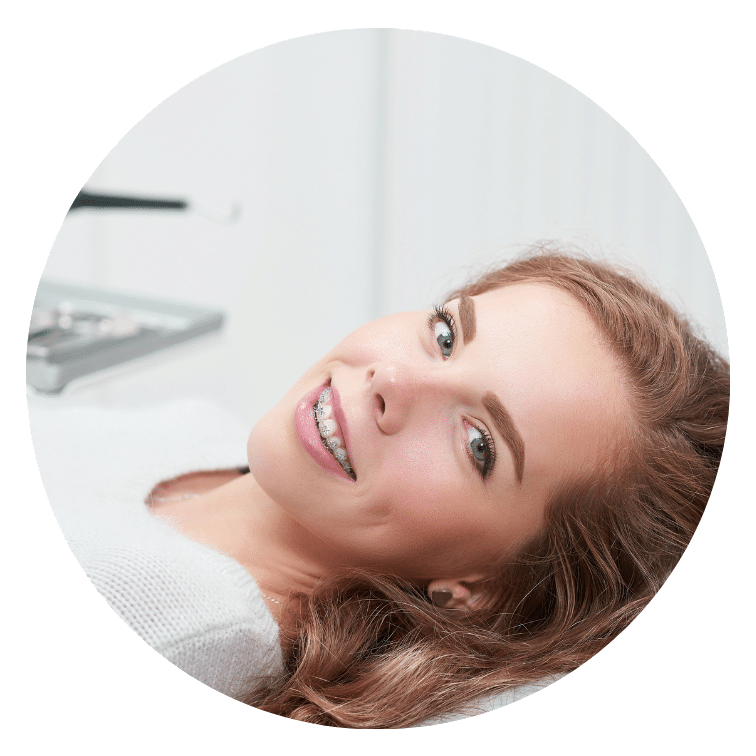 Teen smiling with braces near Seven Oaks SC