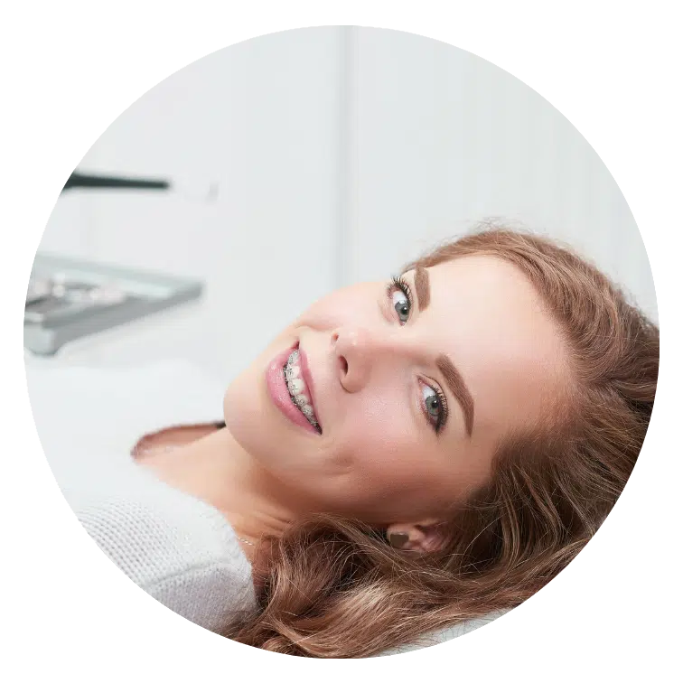 Teen smiling with braces near Seven Oaks SC